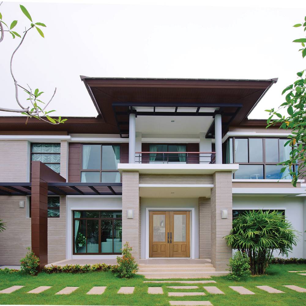 Double doors with glass on two-story modern house