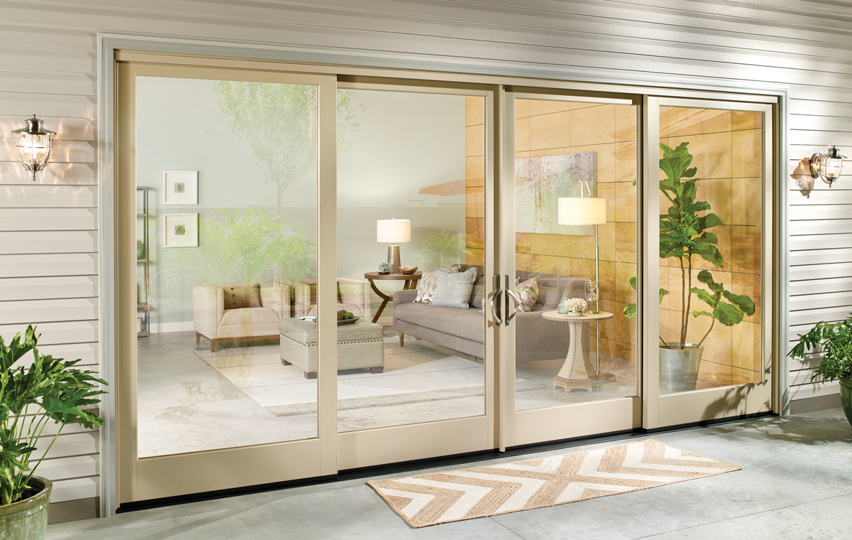 Home exterior with double sliding glass doors.