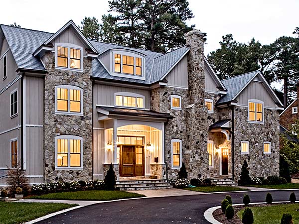 milgard-ultra-fiberglass-windows-on-a-stone-home-with-a-metal-roof