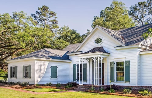 brick skirt with white james hardie siding