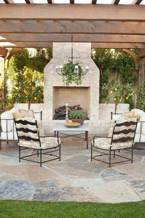 Simple and elegant outdoor chandelier with votive candles.