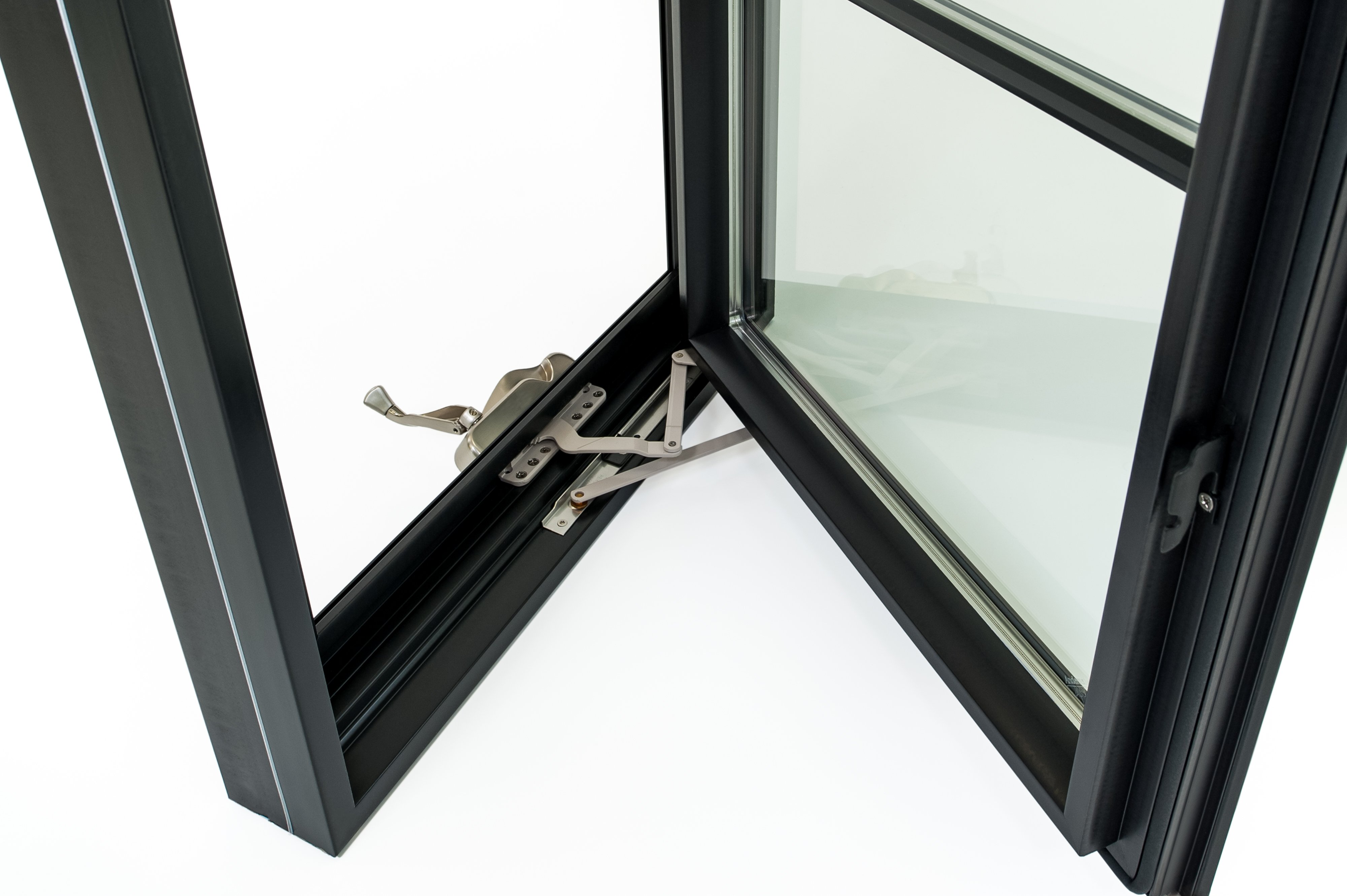 Close-up of Andersen 100 series black Fibrex casement window open to view crank handle hardware.