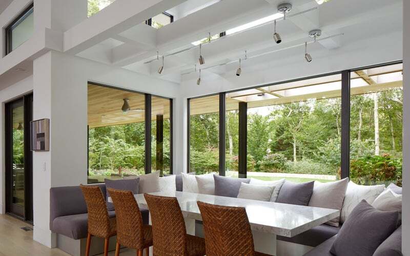 Photo of Andersen E-Series windows in dining room. Image from Andersen Windows and Doors. If you live in North Texas and are interested in purchasing windows like these contact us at Brennan Enterprises to learn about your options.