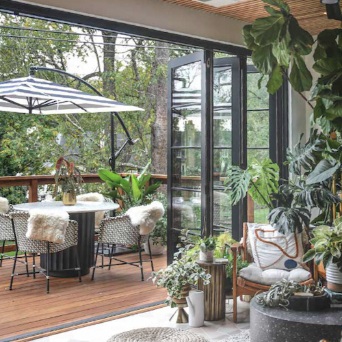 Black bifold door from Andersen. Photo from Andersen.