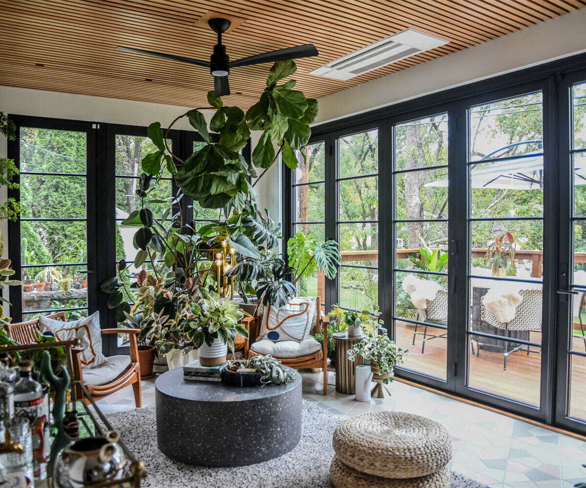 Black outswing bifold doors with horizontal grids. Photo from Andersen.