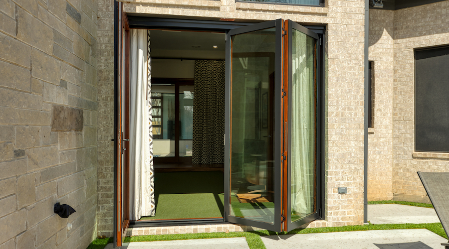 Folding doors installed on Texas home by Brennan Enterprises.