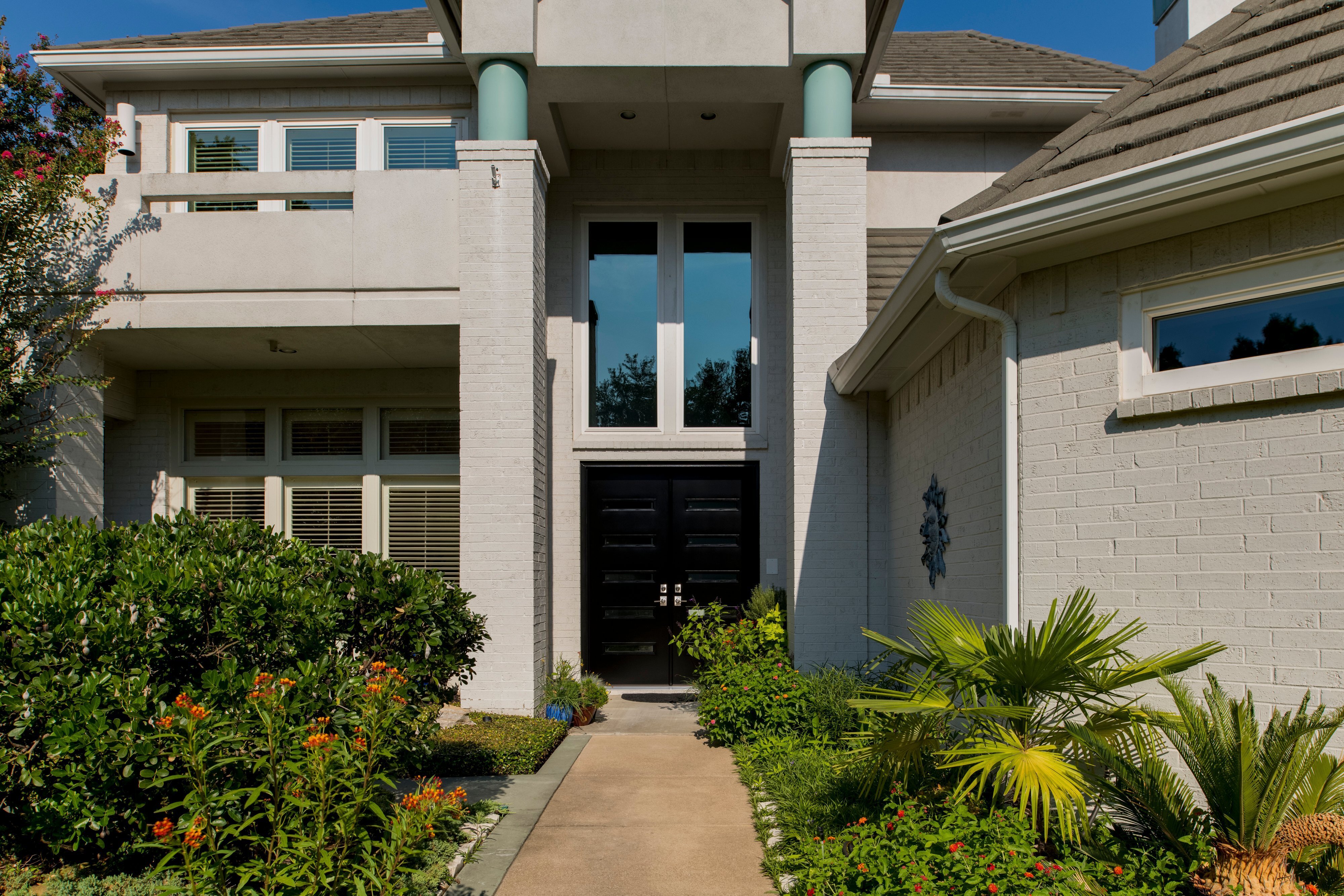 black-french-style-provia-door-walk-way