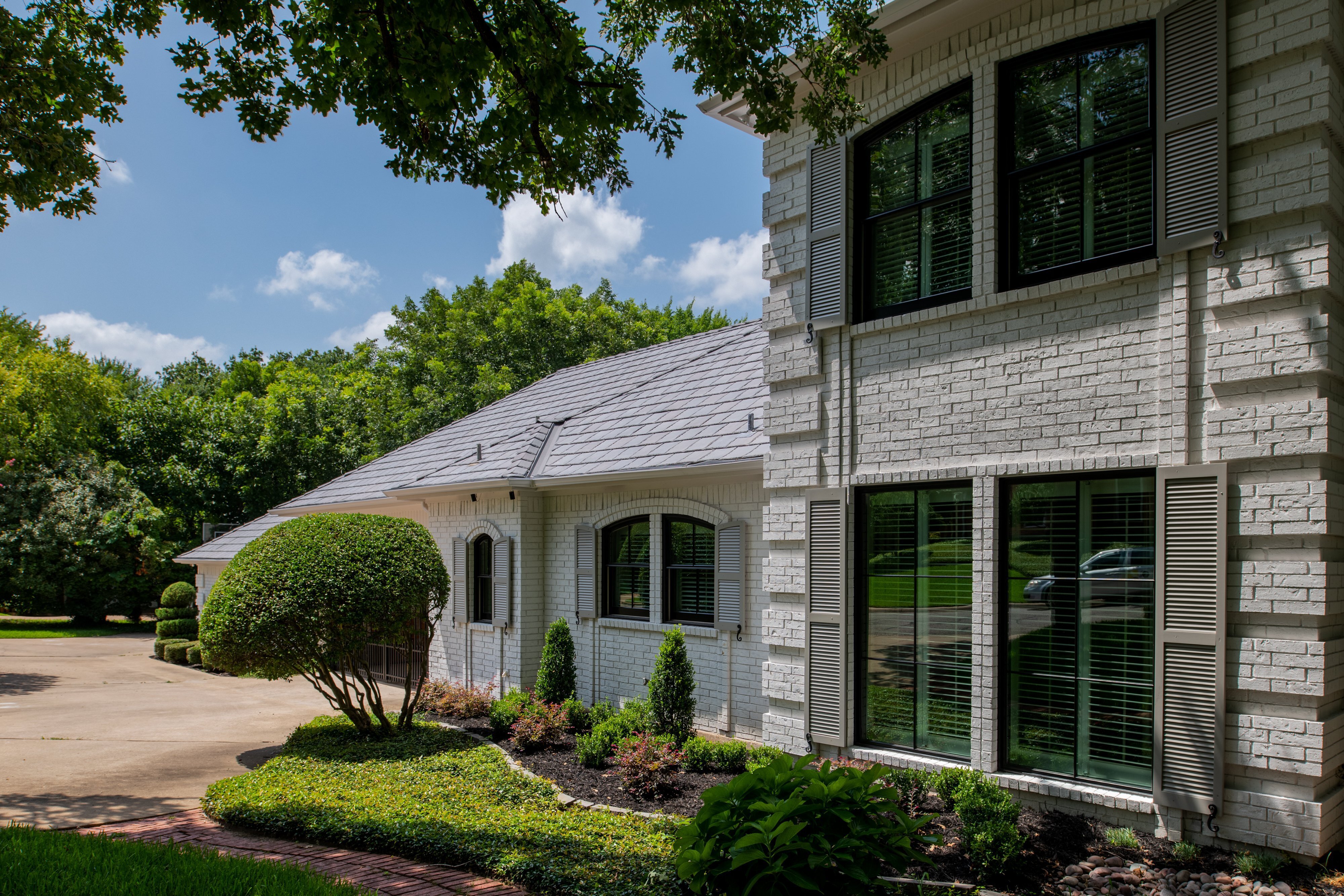 black wood windows with grids