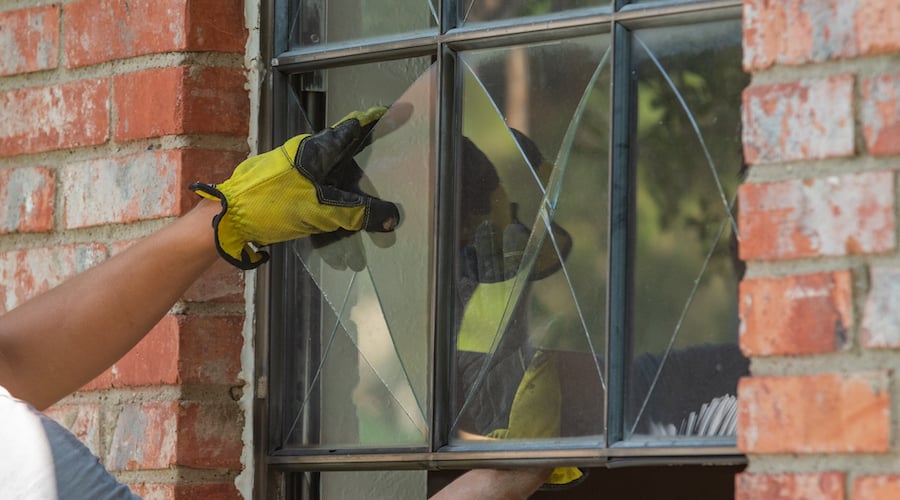 Removing glass pane from window.