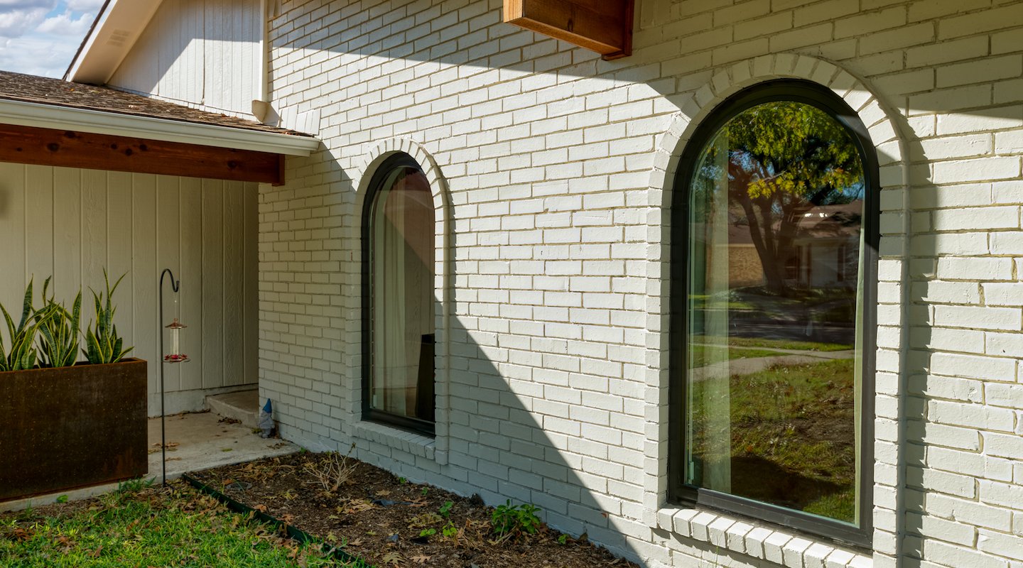 Black Andersen 100 Series windows on a Dallas, Texas home.