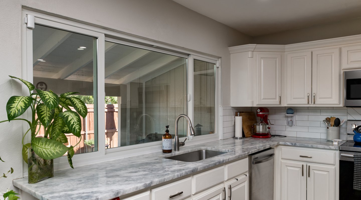 White Andersen 100 Series sliding windows in Dallas, Texas home.