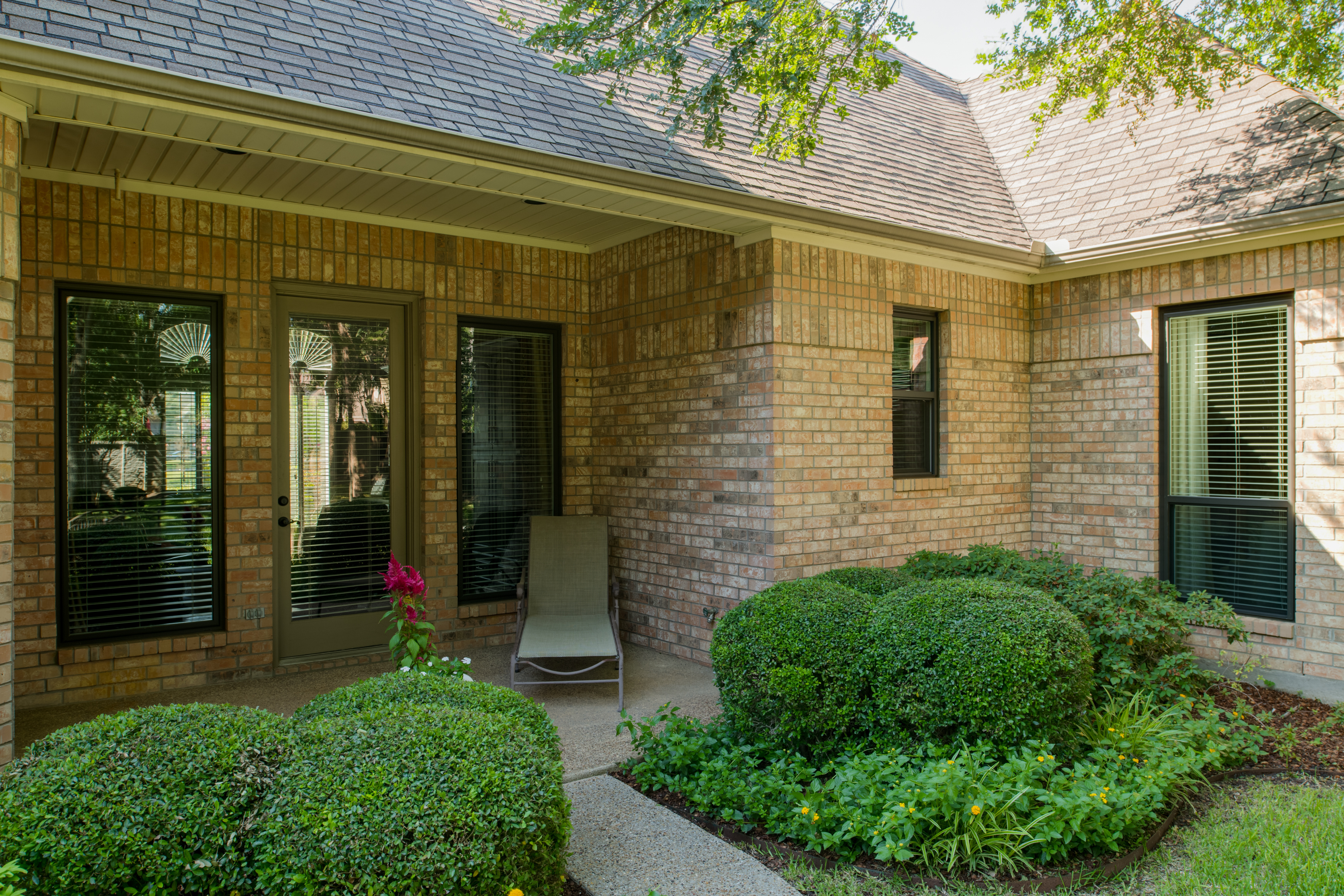 brennan-traditions-backdoor-porch-with-black-trim-windows