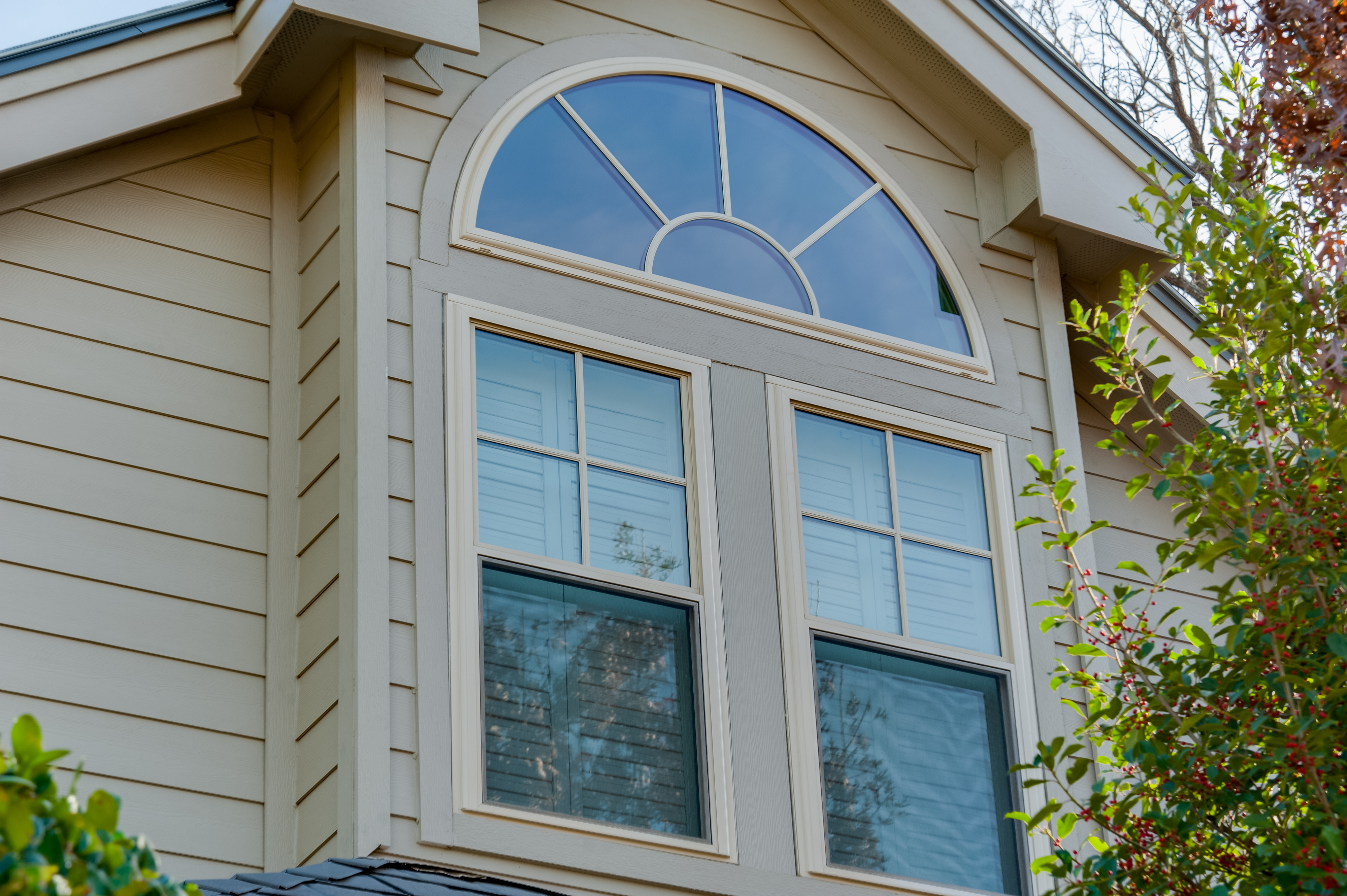 brennan-traditions-half-round-over-two-double-hung-windows