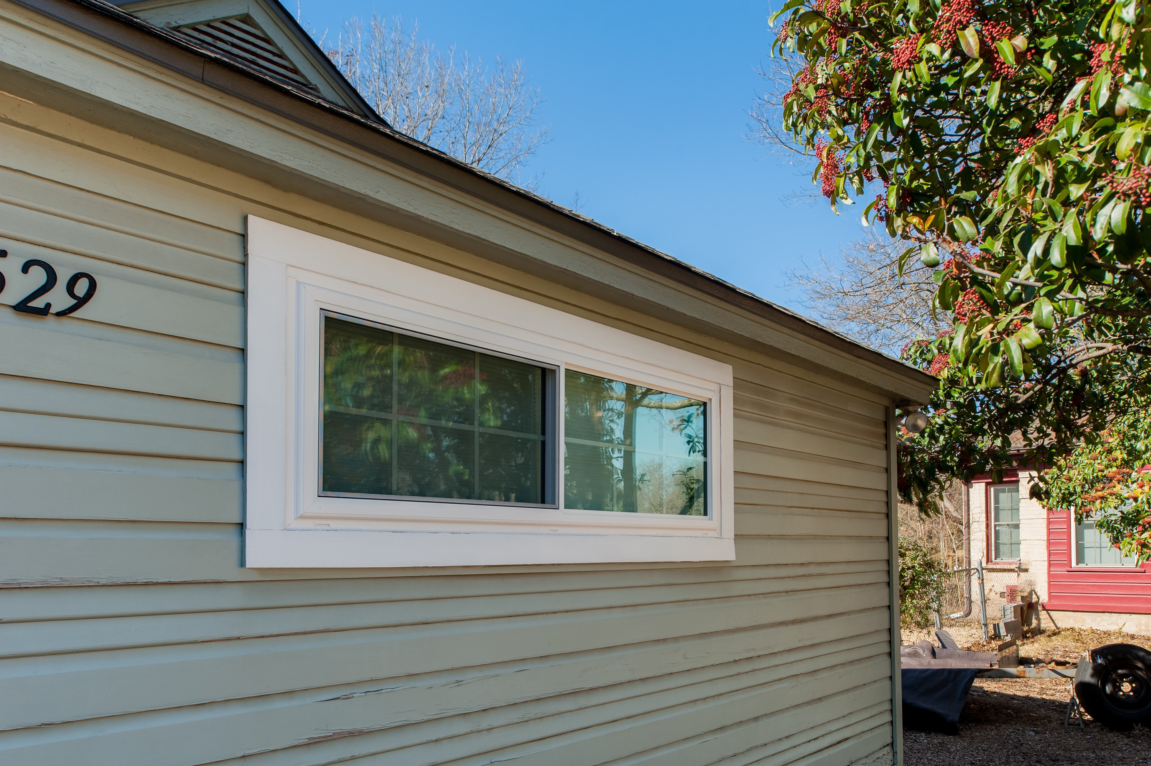 brennan-traditions-white-sliding-window-in-siding