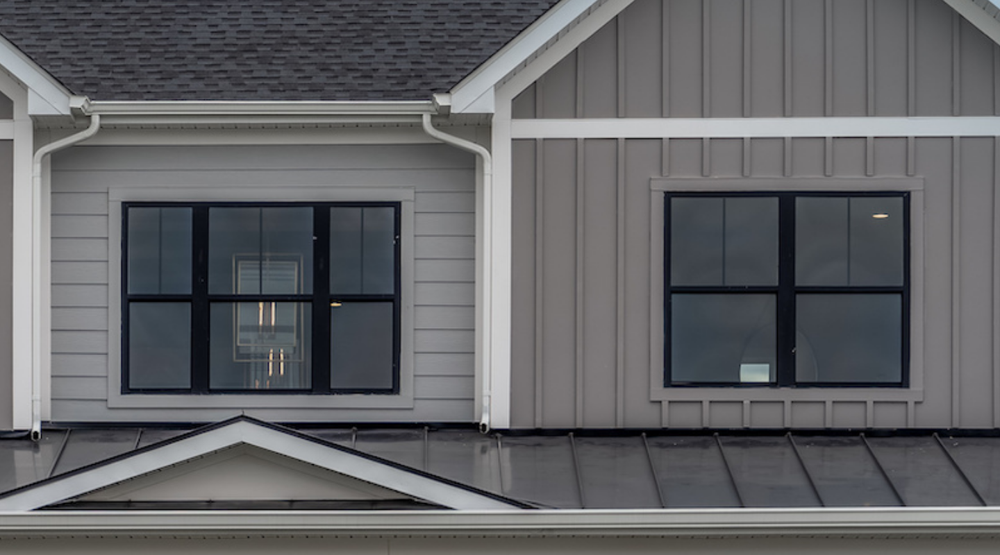 Close up of grids on black aluminum windows. Stock photo.