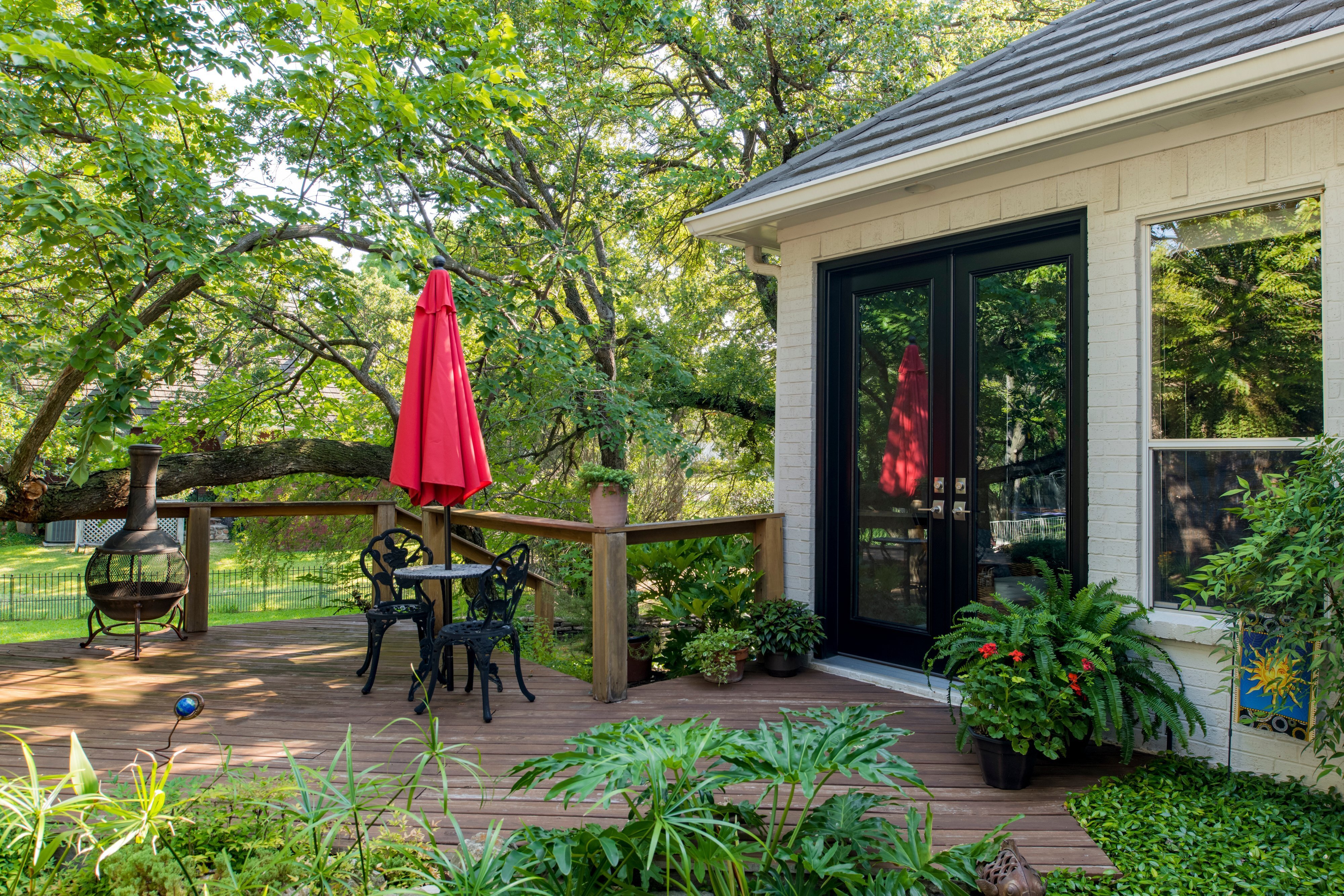 french-style-provia-black-entry-doors-glass-interior-garden-view