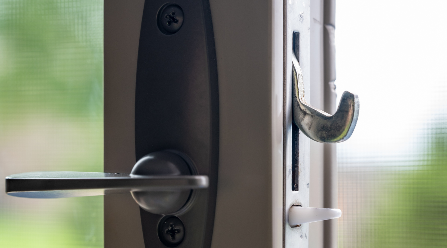 Sliding door hook lock engaged. Photo from Shutterstock.