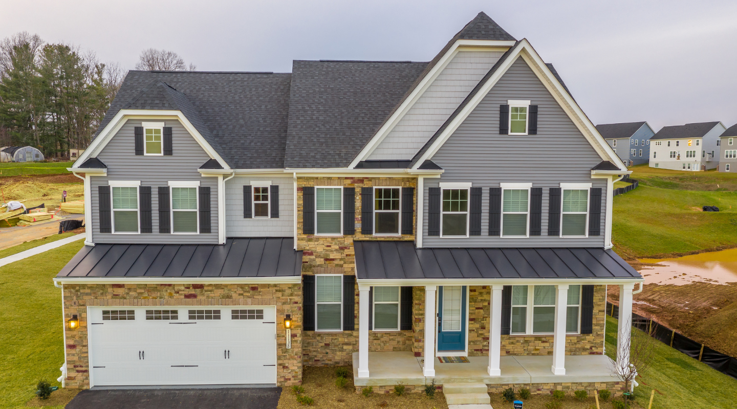 White trim around the windows and doors. Photo from Adobe Stock.