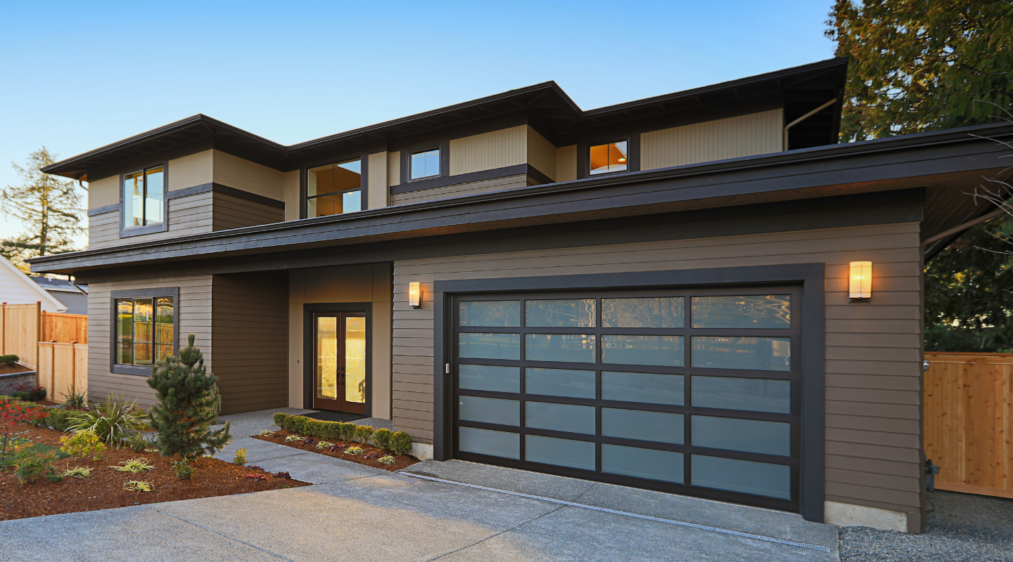 Dark brown trim around windows, doors, and garage. Photo from Adobe Stock.