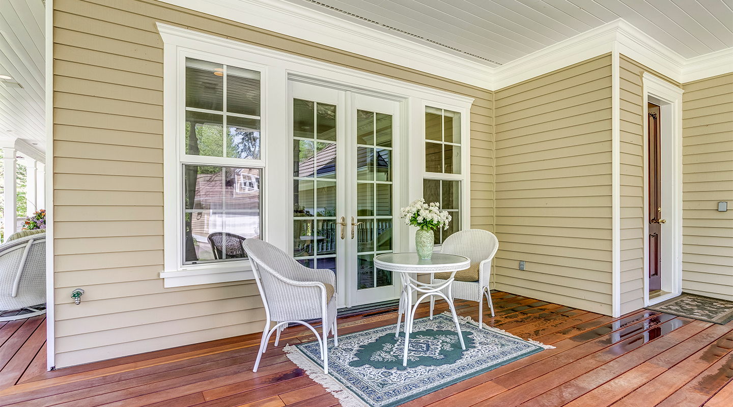 White trim around the door to match the windows. Photo from Adobe Stock.