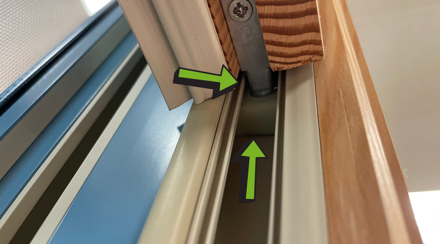 Bottom view of a visible window shoe and tilt pin in the jamb. Photo by Brennan Enterprises.