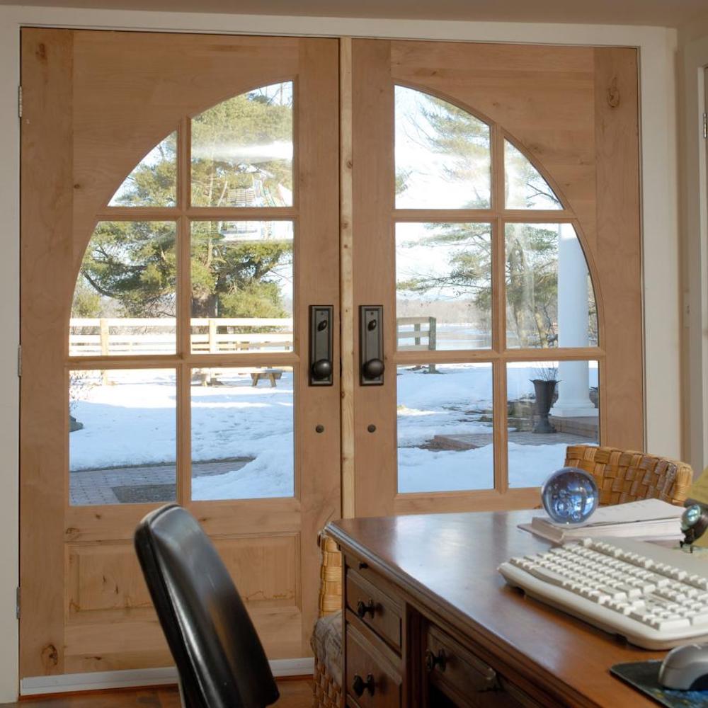 French doors with complementing clear glass shape on each panel.