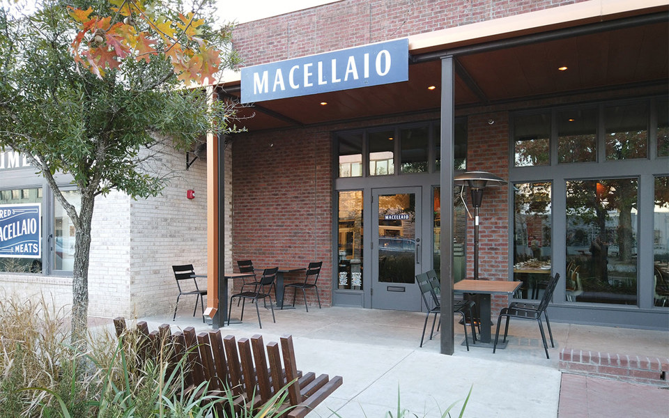 Macellaio restaurant storefront with covered outdoor seating area located in Bishop Arts District.