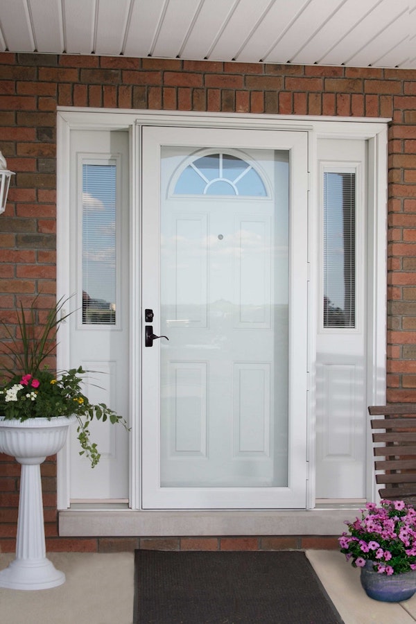 White ProVia storm door with curved handle.