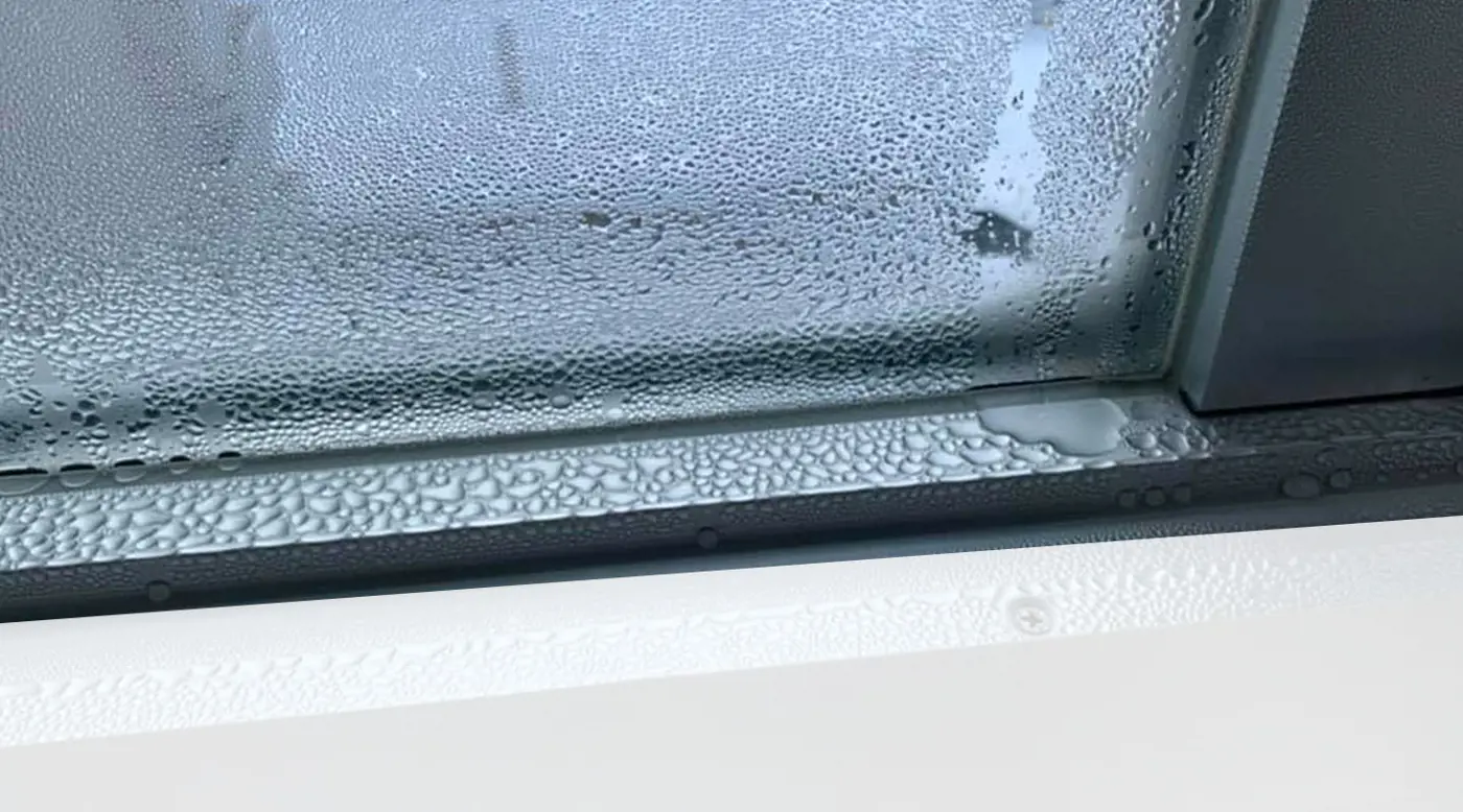 https://brennancorp.com/media/12021/blog-how-to-prevent-condensation-on-aluminum-windows.jpg?width=1400&format=webp&rnd=132464163800830000