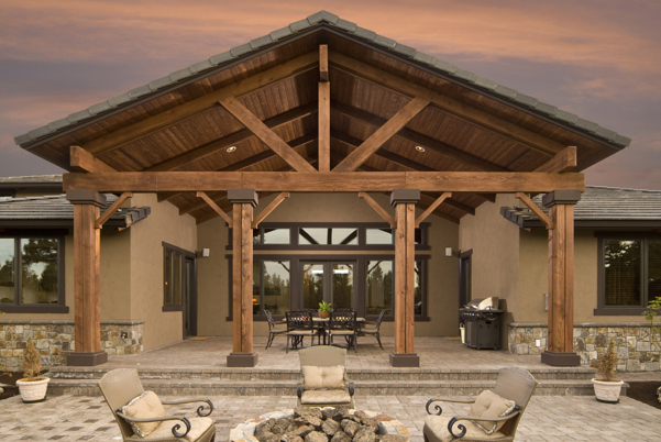 https://brennancorp.com/media/2365/beautiful-oversized-patio-cover-with-columns-stonework-and-a-fireplace.jpg?width=601&height=402&mode=max