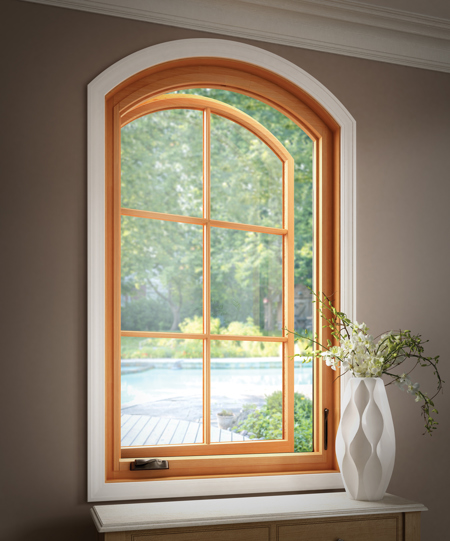 Milgard Essence wood and fiberglass radius casement style window. Brennan Enterprises is a Milgard window dealer in North Texas.