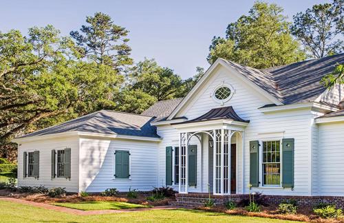 brick skirt with white james hardie siding