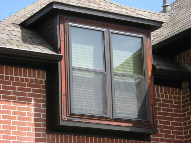 bronze-single-hung-twin-windows-with-red-brick