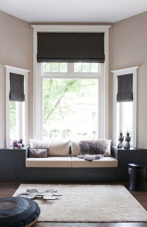 Combine dark and light colors to recreate this cool and modern reading nook.