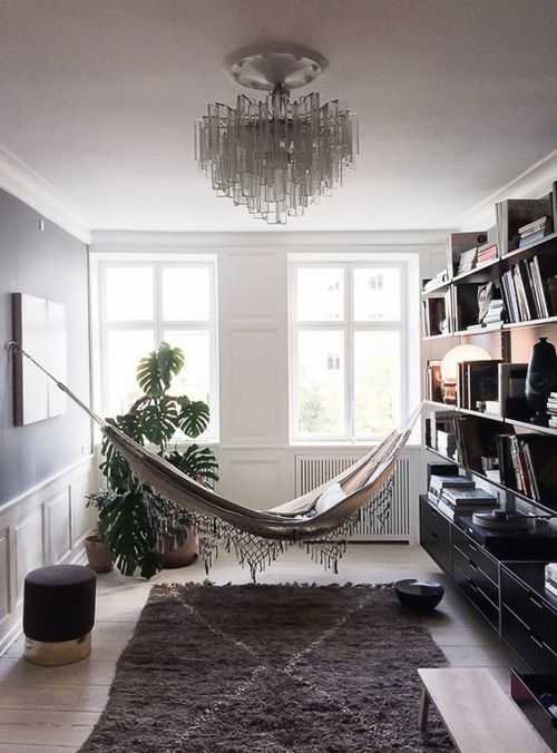 Who said hammocks are for outdoors only? Bring one inside and settle in for some cozy reading time.