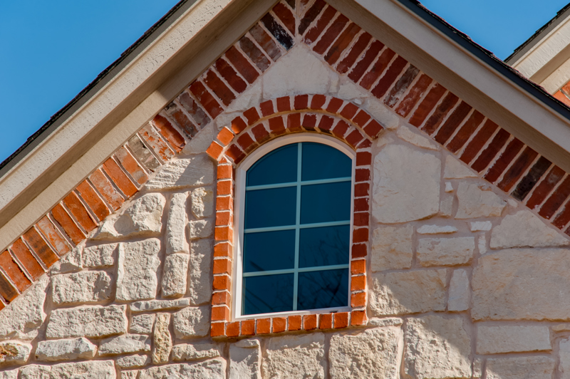 brennan-traditions-window-specialty-stone-and-brick