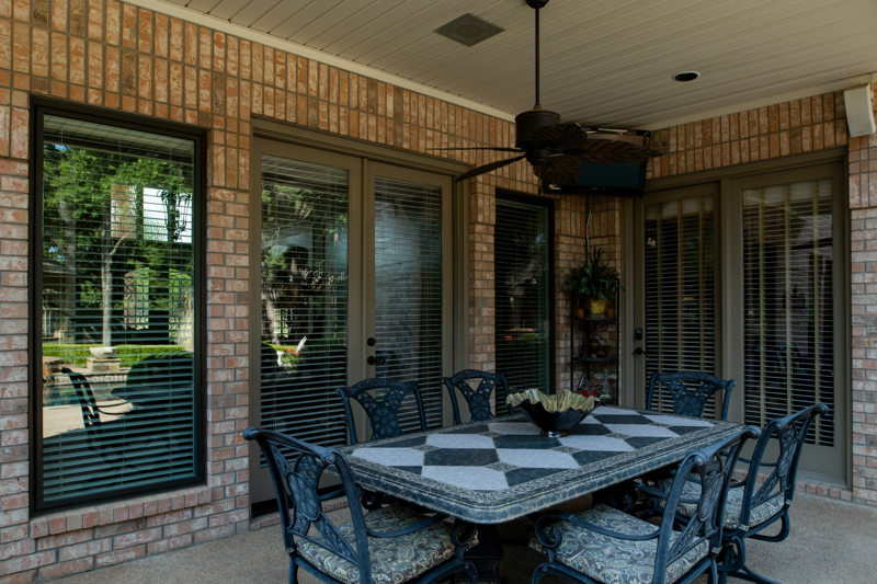 brennan-traditions-backyard-porch-with-black-trim-windows