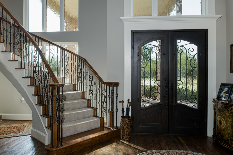 brennan-traditions-interior-view-of-stairwell-and-french-door-white-window-trim-2