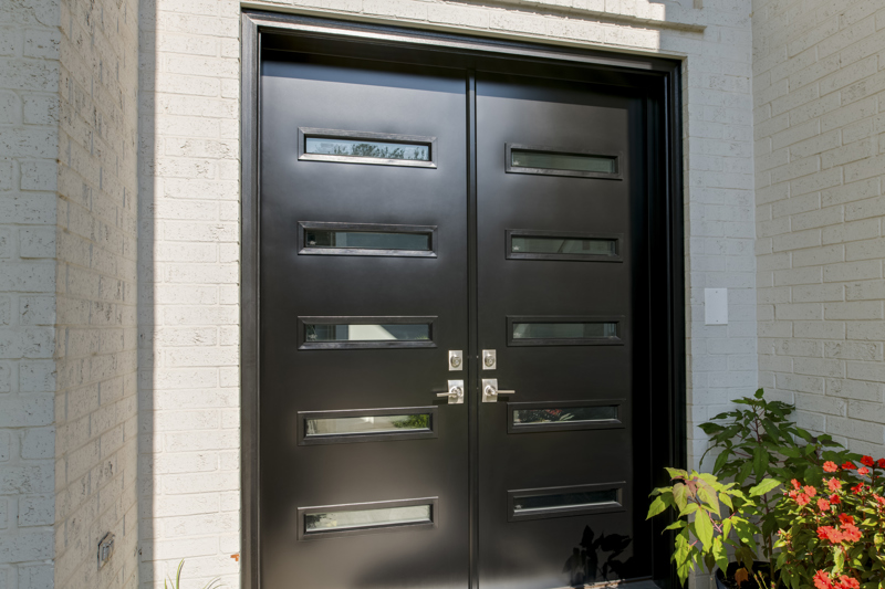 black-french-style-doors-with-glass-panels-close-up