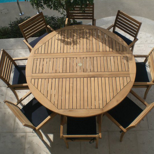 Royal Teak Round Table with seating for 8 from hayneedle
