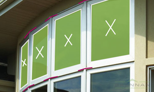 Bow windows are installed at adjoined angles. | Brennan Enterprises, Dallas, Texas.