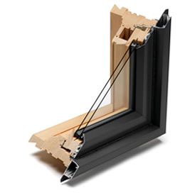 Corner cut of Andersen's E-Series window. This series has a wood interior with an aluminum exterior.