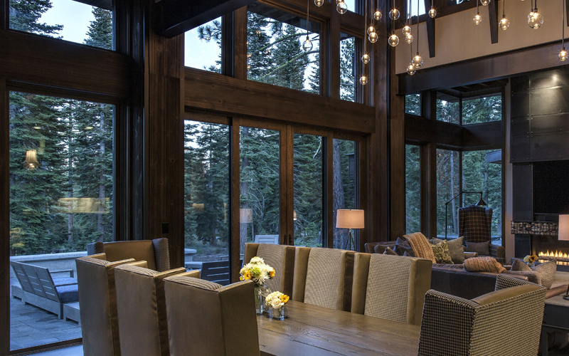 Interior view of dark stained Sierra Pacific all-wood windows. Wood windows add warmth and sophistication to any space.