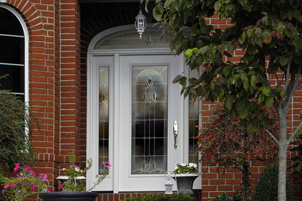 This ProVia Legacy door in a white finish features two sidelites and a transom lite.
