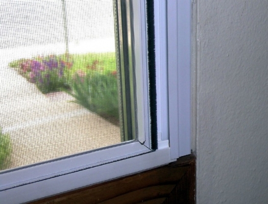Image of interior storm window. Interior storm windows provide an extra layer of protection against outside elements.