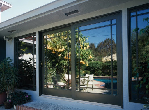 Brennan installed Milgard patio doors with mirror glaze for privacy.