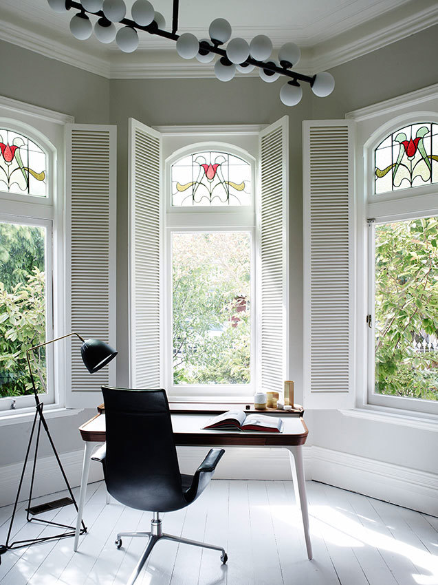 Windows with decorative art glass in modern home office.