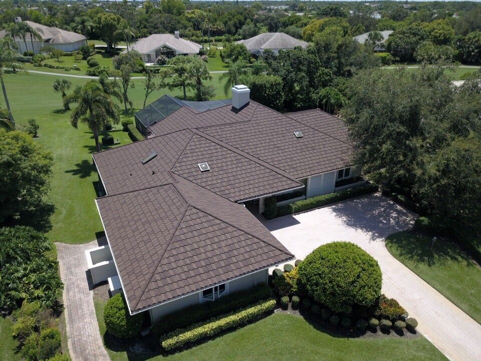 Roof replacement on a home located in a golf community.