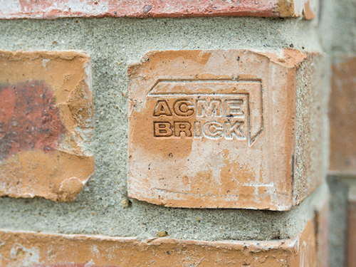Brick with Acme Logo